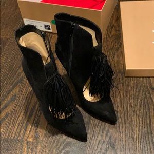 Black suede booties that have never been worn